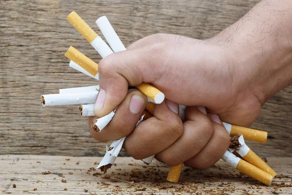 depositphotos_262164586-stock-photo-man-trying-give-smoking-cigarette